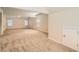 Spacious bonus room with neutral carpet, high ceilings, and plenty of natural light from multiple windows at 3677 Trillium Forest Dr, Snellville, GA 30039