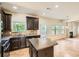 Kitchen with stainless steel appliances, granite countertops, and a center island at 3677 Trillium Forest Dr, Snellville, GA 30039