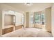 Bright living room featuring large windows and an open layout at 3677 Trillium Forest Dr, Snellville, GA 30039