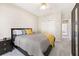 Bedroom with carpeted floor, wardrobe, and natural light from the window at 3072 Oaktree Ln, Duluth, GA 30096
