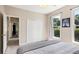 This bedroom has a large closet and window with great natural light at 3072 Oaktree Ln, Duluth, GA 30096