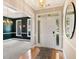 Welcoming foyer with hardwood floors, a chandelier, and views into the dining room at 3072 Oaktree Ln, Duluth, GA 30096