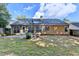 Backyard with a basketball hoop and a cozy space for relaxation at 3625 Ennfield Lane Ln, Duluth, GA 30096