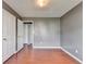 This is a bedroom with hardwood floors, light, and neutral paint at 3625 Ennfield Lane Ln, Duluth, GA 30096