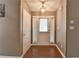 Bright entryway with sidelight windows and wood-look floors at 3625 Ennfield Lane Ln, Duluth, GA 30096