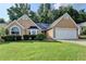 Charming home with a well-manicured lawn, and two-car garage at 3625 Ennfield Lane Ln, Duluth, GA 30096