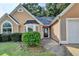 Close up of home's exterior and lush landscaping at 3625 Ennfield Lane Ln, Duluth, GA 30096