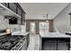 Well-appointed kitchen with stainless steel appliances, island and tile backsplash at 3625 Ennfield Lane Ln, Duluth, GA 30096