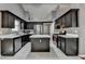 Spacious kitchen with an island, stainless steel appliances, and ample cabinet space at 3625 Ennfield Lane Ln, Duluth, GA 30096