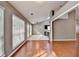 Open floorplan with hardwood floors, neutral walls, vaulted ceilings, and light from the windows and doors at 3625 Ennfield Lane Ln, Duluth, GA 30096