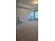 Spacious bedroom featuring neutral carpeting, recessed lighting, and complemented by matching side tables at 776 Tulip Poplar Way, Lawrenceville, GA 30044