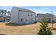 Large backyard with grass at 8587 Secretariat Dr, Lithonia, GA 30058
