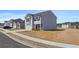 Charming two-story home featuring a two-car garage and classic architectural details at 8587 Secretariat Dr, Lithonia, GA 30058