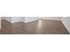 Open-concept living area with hardwood floors and bright natural light at 8587 Secretariat Dr, Lithonia, GA 30058