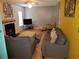 Relaxing living room featuring neutral wall paint, hardwood flooring, and contemporary furniture at 857 Asbury Trl, Lithonia, GA 30058