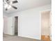 Spacious bedroom featuring neutral walls, closet space, and an attached bathroom at 3170 Cedar Glade Ln, Buford, GA 30519