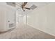 Finished basement with neutral carpet, a ceiling fan, and a view of the backyard at 179 Hunters Crk, Dallas, GA 30157