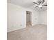 Finished basement with neutral carpet, a ceiling fan, and a door to another finished room at 179 Hunters Crk, Dallas, GA 30157