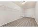 Spacious closet with laminate flooring and a built-in wire shelf at 179 Hunters Crk, Dallas, GA 30157