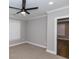 Bedroom with neutral carpeting and modern ceiling fan with ample light at 1174 Donnelly Sw Ave, Atlanta, GA 30310