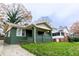 Charming home with a quaint front porch and a well-maintained lawn at 1174 Donnelly Sw Ave, Atlanta, GA 30310