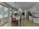 A kitchen that offers stainless appliances, granite countertops, island and eat-in dining area at 1614 Summersweet Ln, Dacula, GA 30019