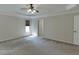 Main bedroom features a ceiling fan, crown molding, and a window at 1614 Summersweet Ln, Dacula, GA 30019