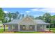 Charming home with a welcoming front porch and manicured lawn at 1943 Lake Chase Ln, Jonesboro, GA 30236