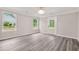 Bright room featuring an elegant light fixture, white trim, and outdoor views at 1943 Lake Chase Ln, Jonesboro, GA 30236