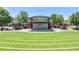 An outdoor amphitheater featuring lush green lawn seating, perfect for community events and performances at 3415 Crop Corner Rd, Suwanee, GA 30024