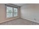 Carpeted bedroom with natural light from the two windows at 3415 Crop Corner Rd, Suwanee, GA 30024