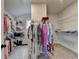 Large walk-in closet with ample storage and clothing racks at 3415 Crop Corner Rd, Suwanee, GA 30024