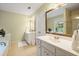 Bright bathroom featuring tiled floors, double sinks, and a walk-in shower at 1079 Angel Ln, Powder Springs, GA 30127