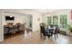 Eat-in kitchen dining area with tile floors and sunlit windows for casual meals at 1079 Angel Ln, Powder Springs, GA 30127