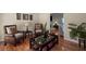 Comfortable living area featuring hardwood floors and traditional decor with comfortable seating at 1079 Angel Ln, Powder Springs, GA 30127