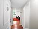 Bright hallway leading into a living space with hardwood floors and natural light at 2965 Pharr Court South Nw # 1-110, Atlanta, GA 30305