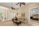 Inviting living room with sofa, chair, and view to the main bedroom in an open concept layout at 8189 N Pine Cone N Dr, Villa Rica, GA 30180