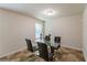 Dining room with modern table, stylish chairs, and natural light at 5622 Laurel Ridge Dr, Atlanta, GA 30344