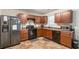 Well-equipped kitchen with dark cabinetry, modern appliances, and functional layout at 5622 Laurel Ridge Dr, Atlanta, GA 30344
