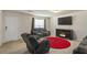 Relaxing living room featuring comfortable furniture, fireplace and TV at 5622 Laurel Ridge Dr, Atlanta, GA 30344