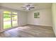 This well lit bedroom has a ceiling fan and views to the tree lined outdoors at 2540 Rocky Springs Dr, Marietta, GA 30062