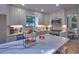 Updated kitchen with white cabinetry, stainless steel appliances, and a central island perfect for entertaining at 2540 Rocky Springs Dr, Marietta, GA 30062