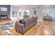 Spacious open concept living room with hardwood floors and access to the kitchen and dining room at 2540 Rocky Springs Dr, Marietta, GA 30062
