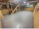 Spacious basement featuring stairs and updated flooring, ready for customization and additional living space at 4023 Oak Crest Dr, Tucker, GA 30084