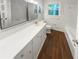 Bathroom with neutral colored single vanity, tile floors, and a shower-tub combination at 4023 Oak Crest Dr, Tucker, GA 30084