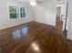 Comfortable bedroom boasts hardwood floors, ceiling fan, and inviting natural light at 4023 Oak Crest Dr, Tucker, GA 30084