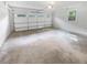 A spacious garage with a large door, offering ample parking and storage solutions at 4023 Oak Crest Dr, Tucker, GA 30084