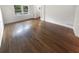 Sun-filled living room features hardwood floors, white walls, and an abundance of natural light at 4023 Oak Crest Dr, Tucker, GA 30084