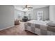 Spacious bedroom featuring natural light, a ceiling fan, and room for a desk at 124 Freedom Dr, Acworth, GA 30102
