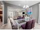 Open-concept dining room with stylish furnishings seamlessly connected to the living area at 124 Freedom Dr, Acworth, GA 30102